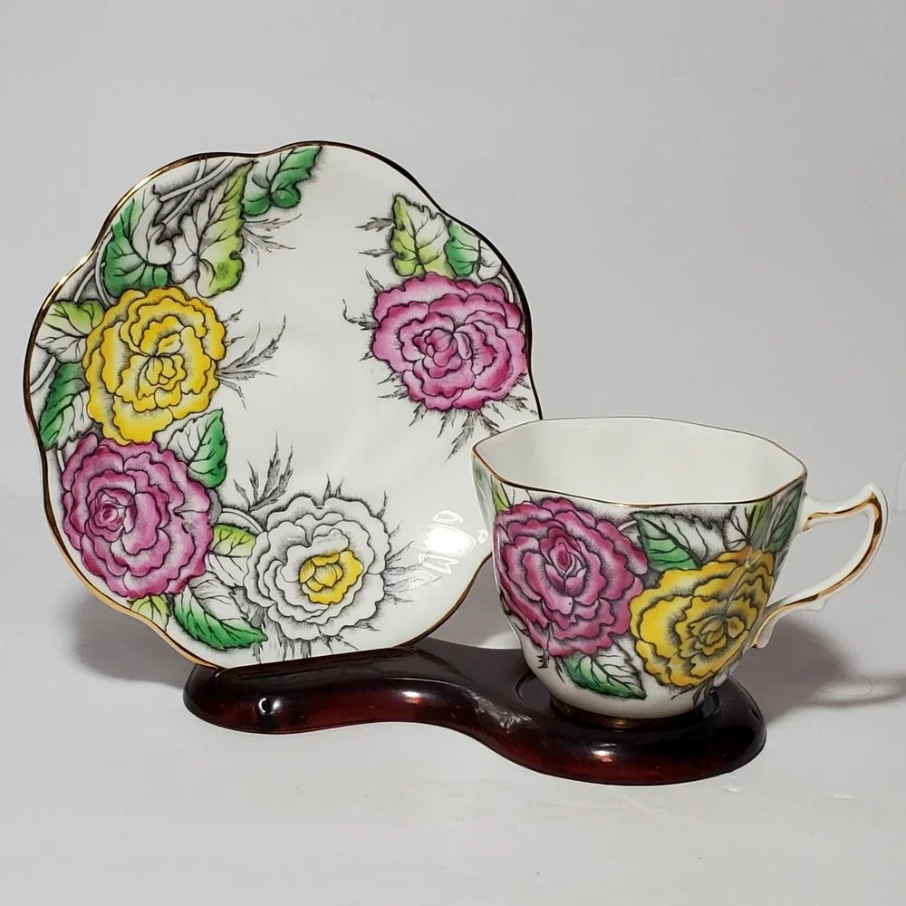 Rosina Teacup and Saucer Floral Pink Yellow White Vintage